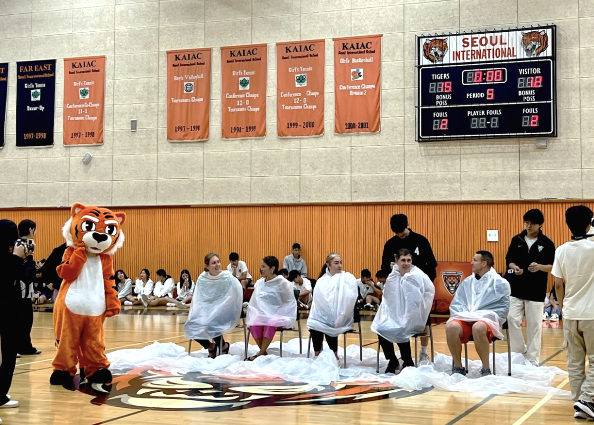 Coaches sitting for egg roulette